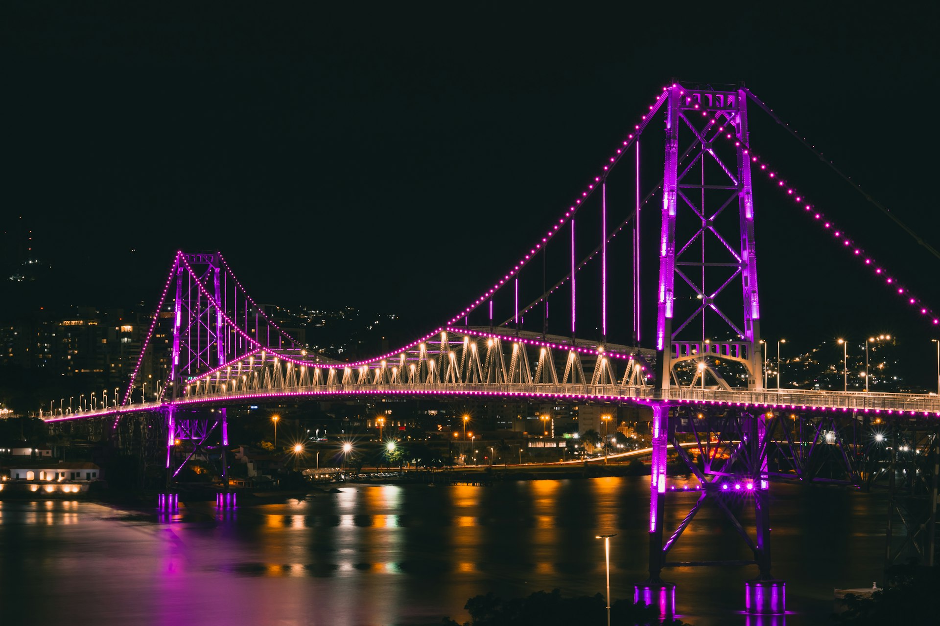 Engineered bridge with purple lights representing integrated business systems business process improvement